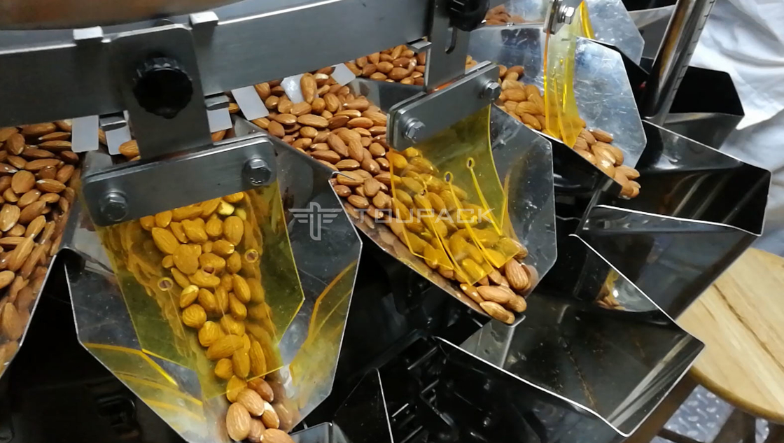 دستگاه بسته بندی توزین تمام اتوماتیک نوار نقاله Z آسانسور برای اسنک برنج بادام زمینی کشمشی فصلی